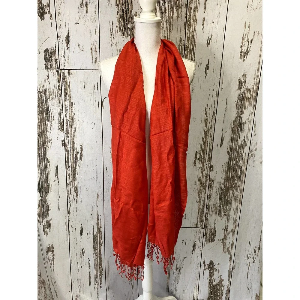 Red Scarf With A Fringed Hem